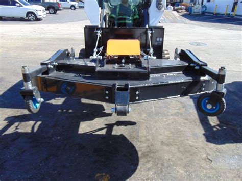 wolverine skid steer attachments reviews